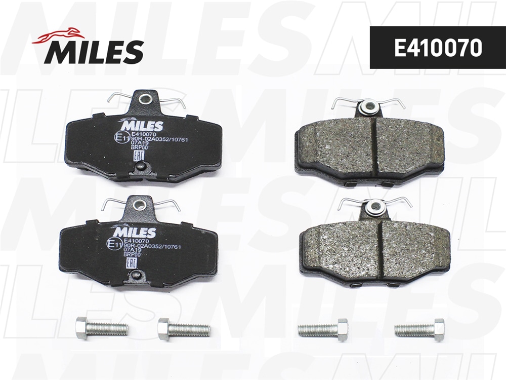 MILES E410070 Колодки тормозные задние (без датчика + болты) (Смесь Low-Metallic) (NISSAN ALMERA N16, PRIMERA P10-11) (TRW GDB3092) E410070